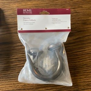 Oil rubbed bronze drapery holdbacks